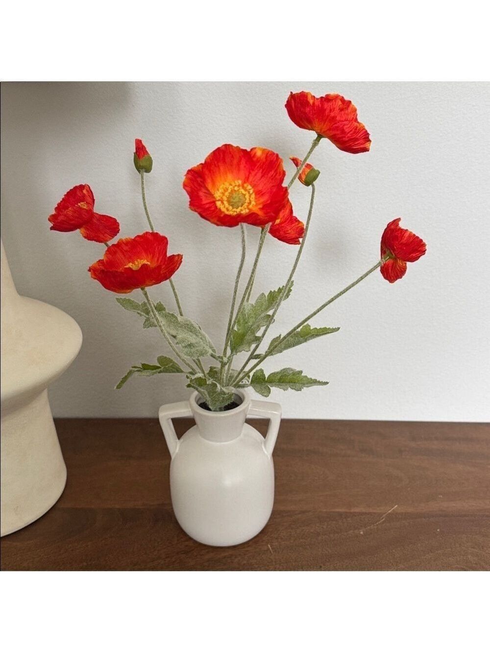 Vibrant orange/redPoppy Flowers in White Vase
